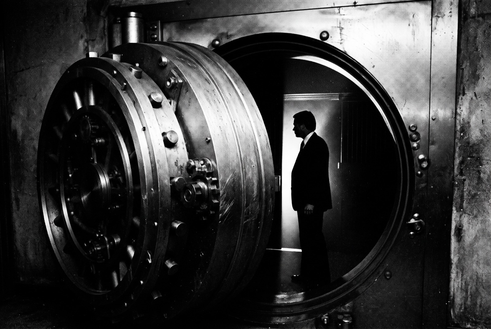 A bank vault door, half open
